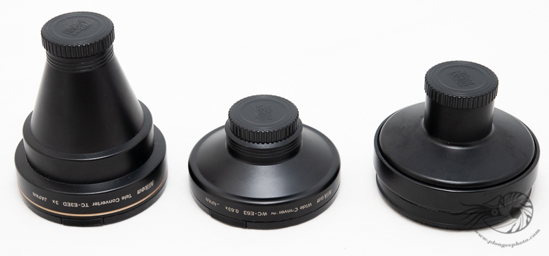 Les 3 pré-optiques Nikon pour le Coolpix 990. De gauche à droite: le zoom 3x, le grand-angle x0.63 et le fish-eye circulaire.